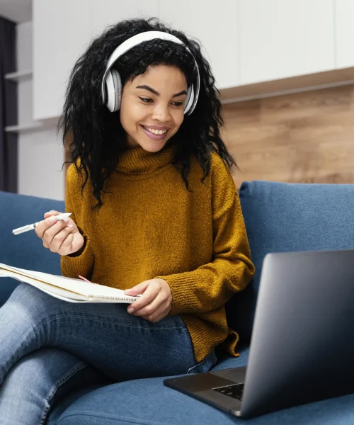 front-view-smiley-teenage-girl-with-headphones-online-school